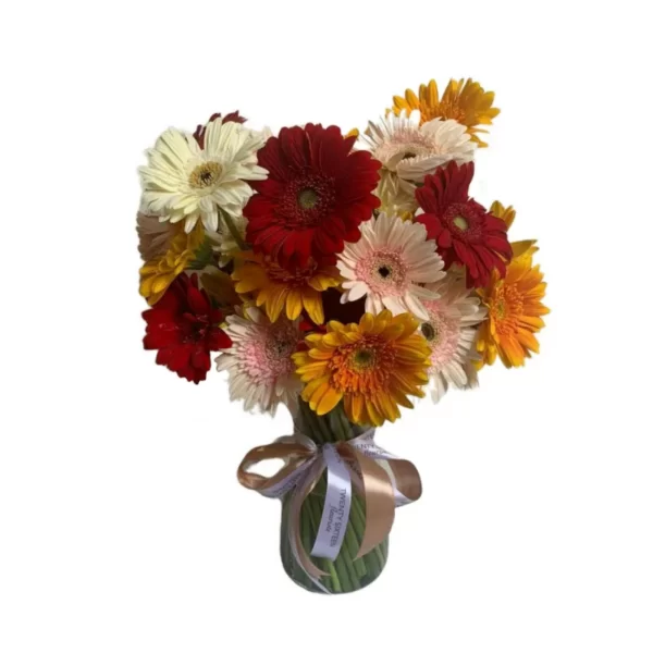 mixed color gerberas in a glass vase