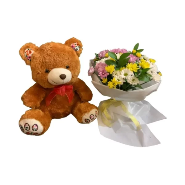 a teddy bear and mixed-color chrysanthemums bouquet