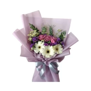 bouquet of white gerberas and purple roses