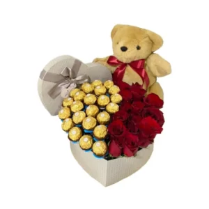 teddy bear, ferrero rocher, and red roses in a heart-shaped box