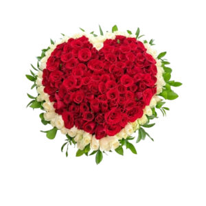 heart-shaped arrangement of white and red roses