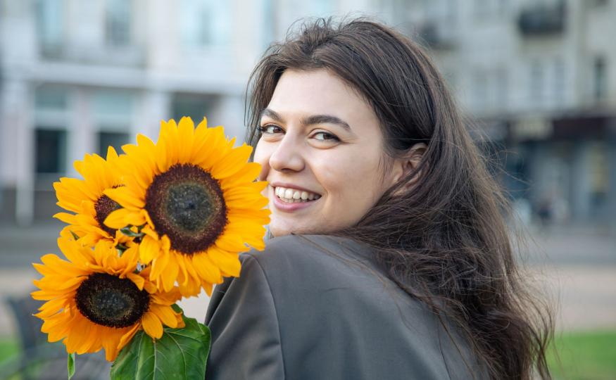 a woman with her favorite flower
